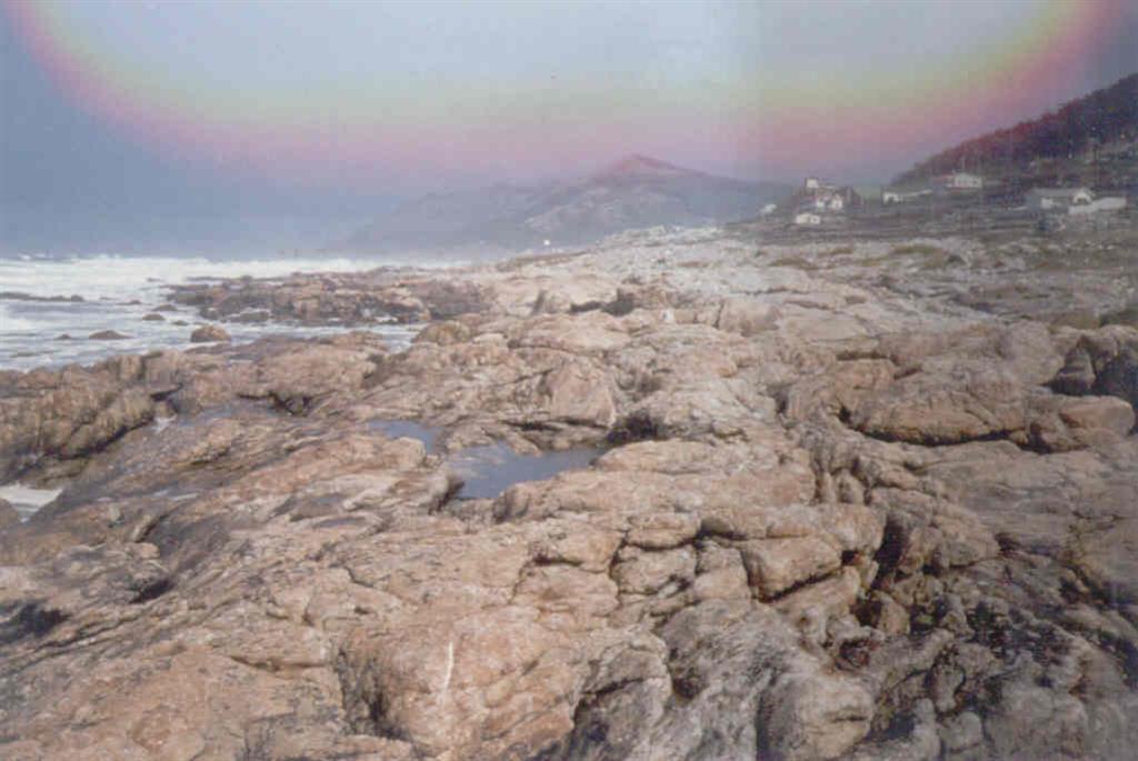 Zona de costa comprendida entre la fábrica de cerámica de la parte W. del Monte Santa Tecla y el rompeolas de la Guardia.